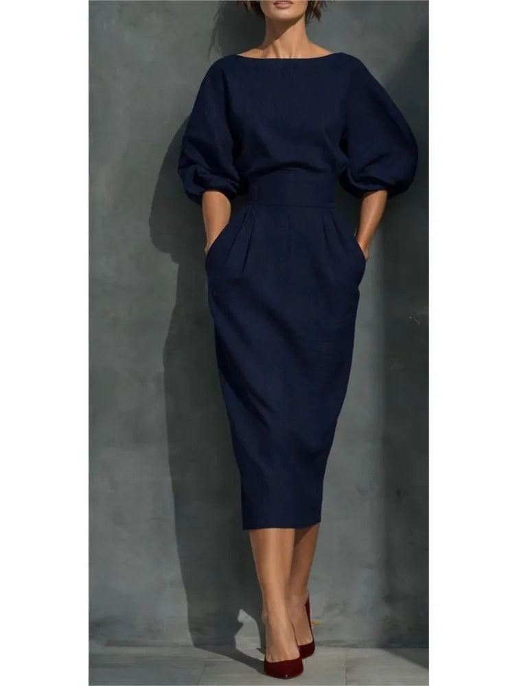 Women's formal midi dress with elegant pleats, flowy wrap skirt, and distinctive lantern sleeves for office wear.