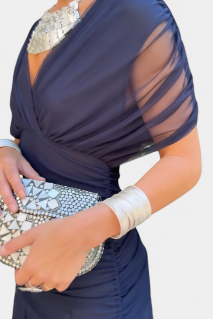 Elegant women's off-shoulder maxi dress, a long, draped evening gown ideal for formal occasions.