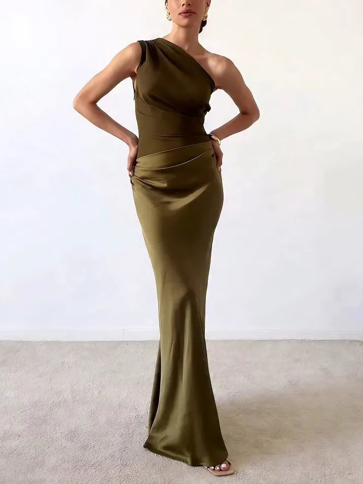 Women's one-shoulder pleated maxi dress for wedding guests. Elegant formal gown, ideal for parties.