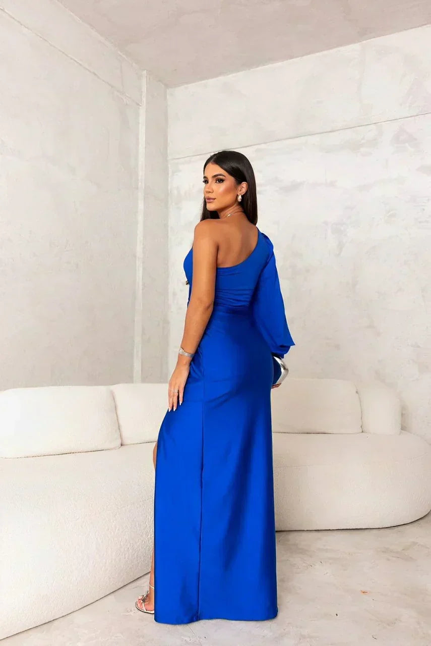 Stylish one-shoulder long dress with a modern twist detail, perfect for formal events & wedding guests.