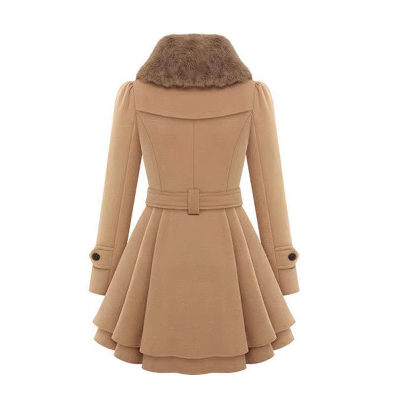 Women's elegant winter coat featuring a chic faux fur collar and unique layered hem for timeless style.