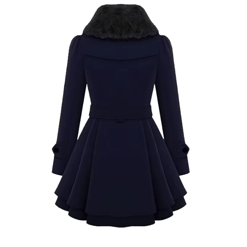 Fashionable women's overcoat showcasing a sophisticated faux fur collar and distinctive layered hem design.