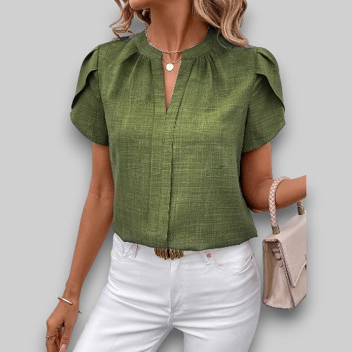 Stylish women's short sleeve top, a versatile petal sleeve blouse, ideal for effortless chic summer fashion.