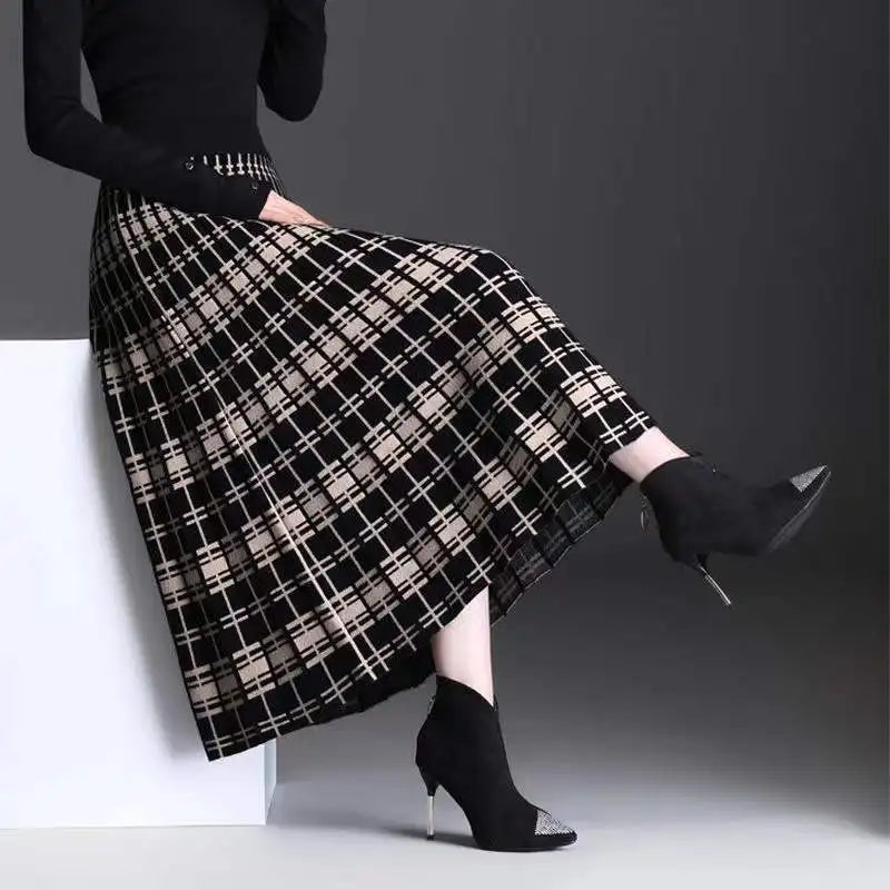 Elegant women's pleated midi skirt, high waist A-line design, perfect for chic casual or work wear.