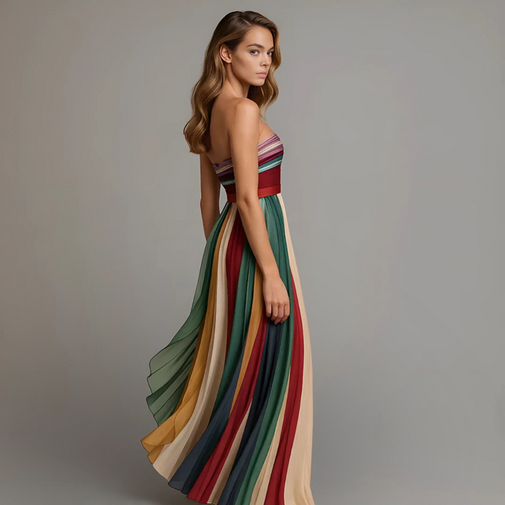 Sophisticated pleated strapless maxi dress for women. Long, elegant, and perfect as a formal evening gown or party dress.