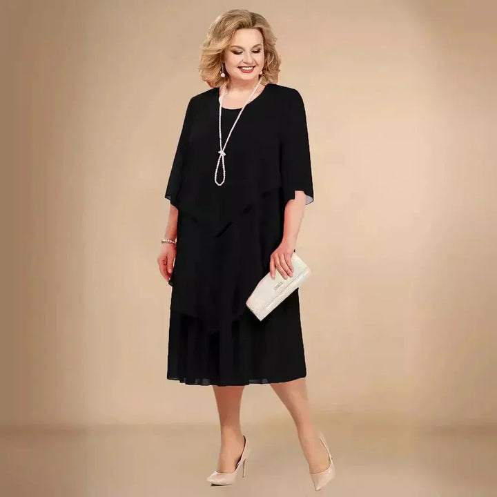Elegant women's plus size asymmetrical midi dress for formal special events and evening wear.