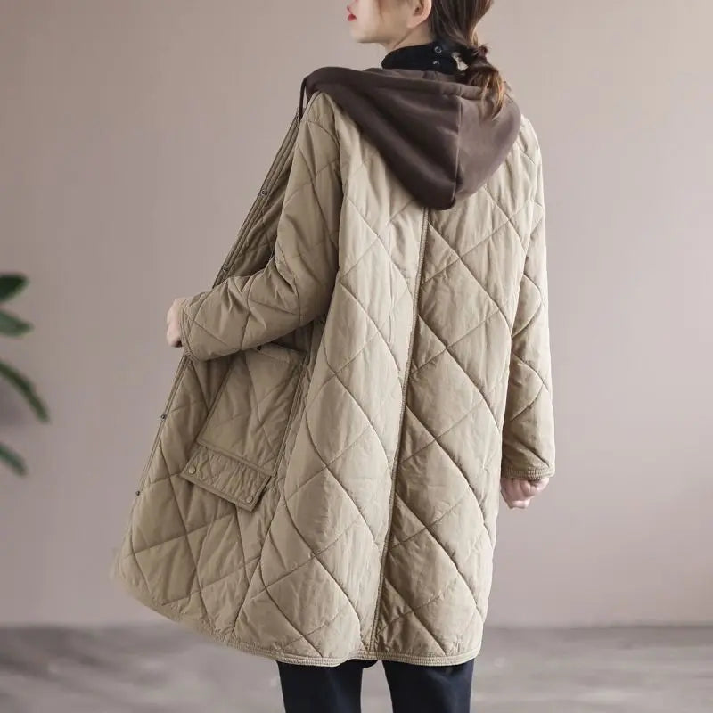 Warm women's plus size hooded coat. Elegant mid-length winter jacket, single-breasted style.