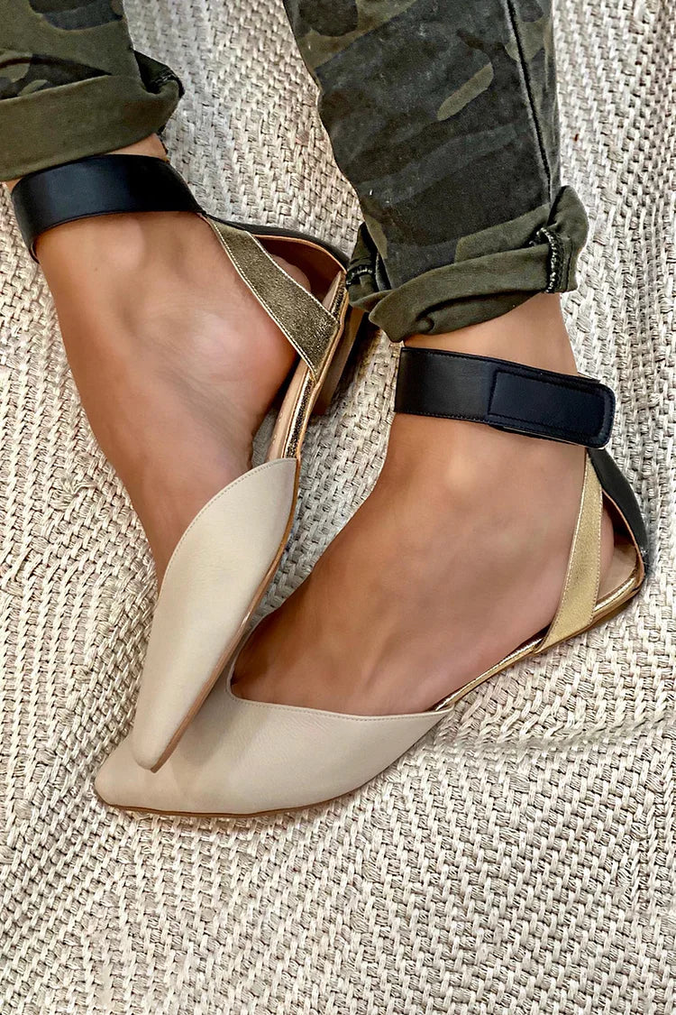 Elegant women's pointed-toe flats with delicate ankle strap, perfect for office or chic daily wear.