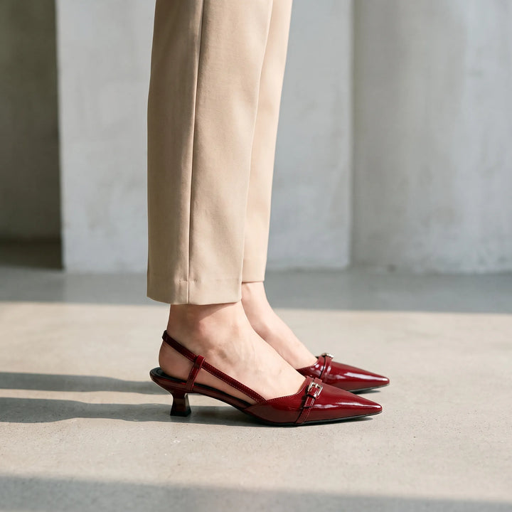 Elegant women's pointed toe slingback heels with kitten heel, perfect for office wear or evening events.