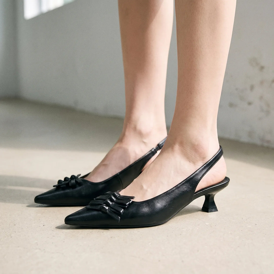 Elegant women's pointed toe slingback kitten heels in a sophisticated design, perfect for dressy occasions.