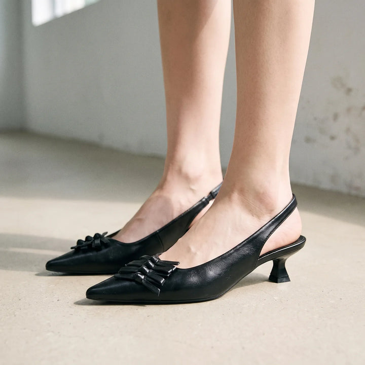 Elegant women's pointed toe slingback kitten heels in a sophisticated design, perfect for dressy occasions.