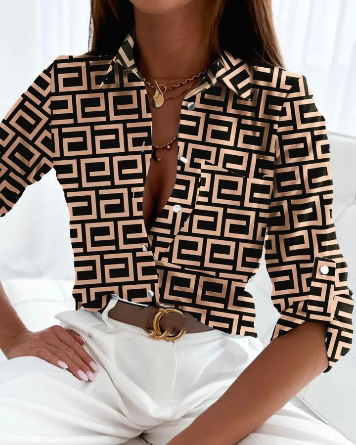 Versatile women's fashion top with an elegant artistic print. Chic & comfortable blouse for sophisticated style.
