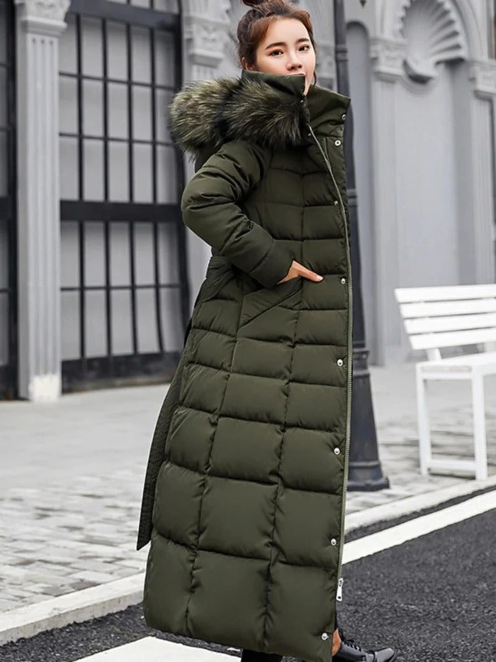 Luxurious down puffer jacket for women. Elegant, warm, and cozy winter coat with stylish long sleeves.