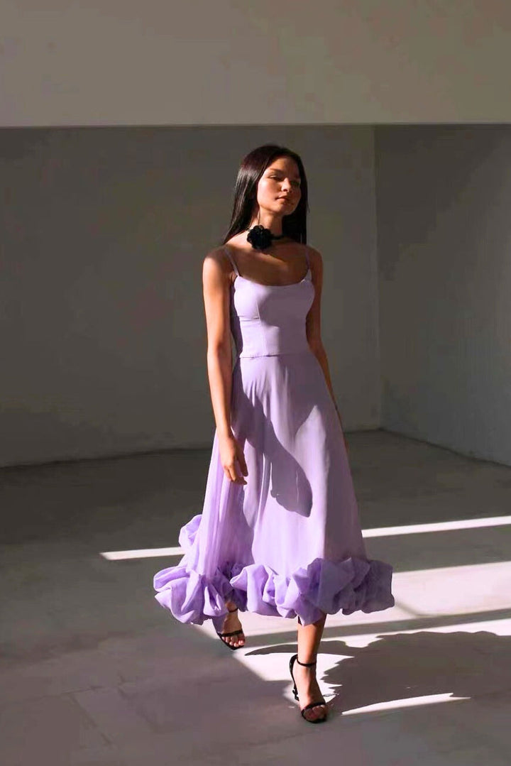 Stylish women's special occasion maxi dress with a flowing ruffle hem and chic scoop neck.