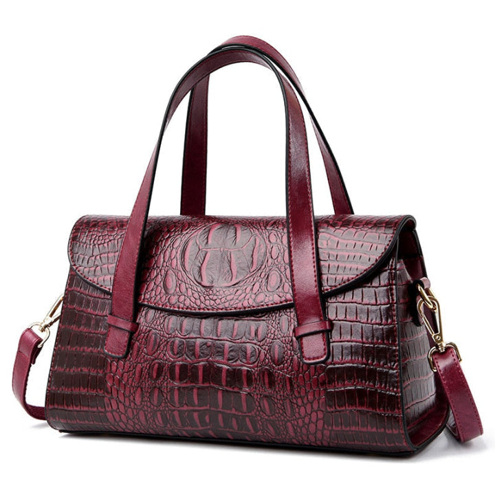 Modern elegant women's shoulder bag with a unique embossed crocodile print design. Stylish and practical.
