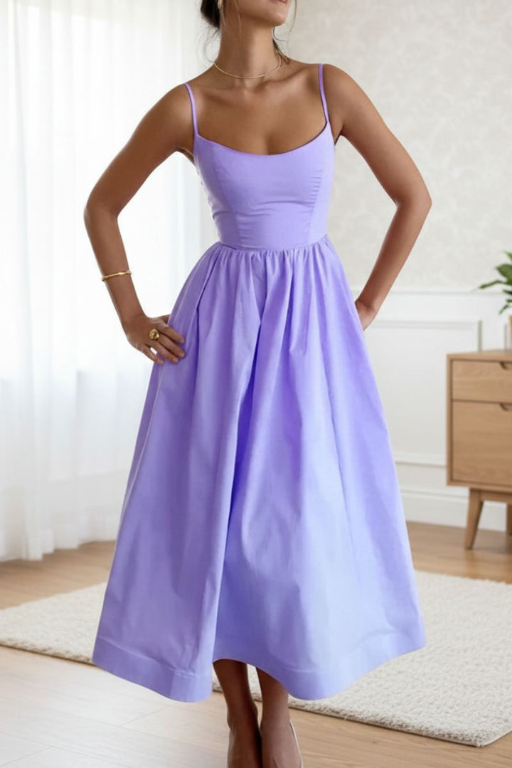Stylish women's fit-and-flare midi dress, sleeveless & scoop neck, a classic choice for parties & special occasions.