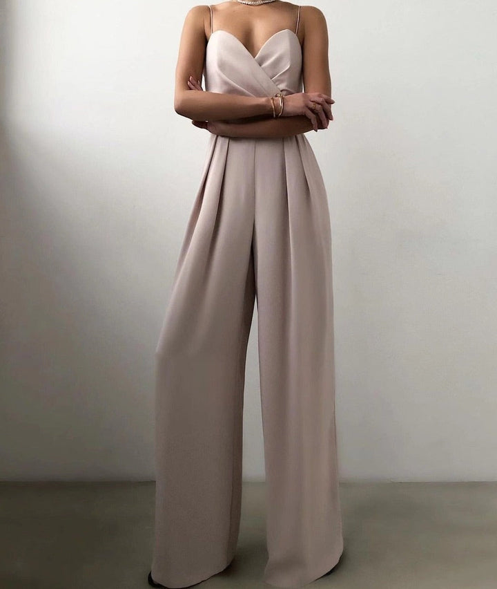 Sophisticated women's jumpsuit with delicate spaghetti straps & a flattering wide-leg silhouette.