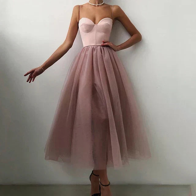 Chic women's strapless maxi evening gown, designed for special occasions, proms & formal parties. Elegant & flattering.