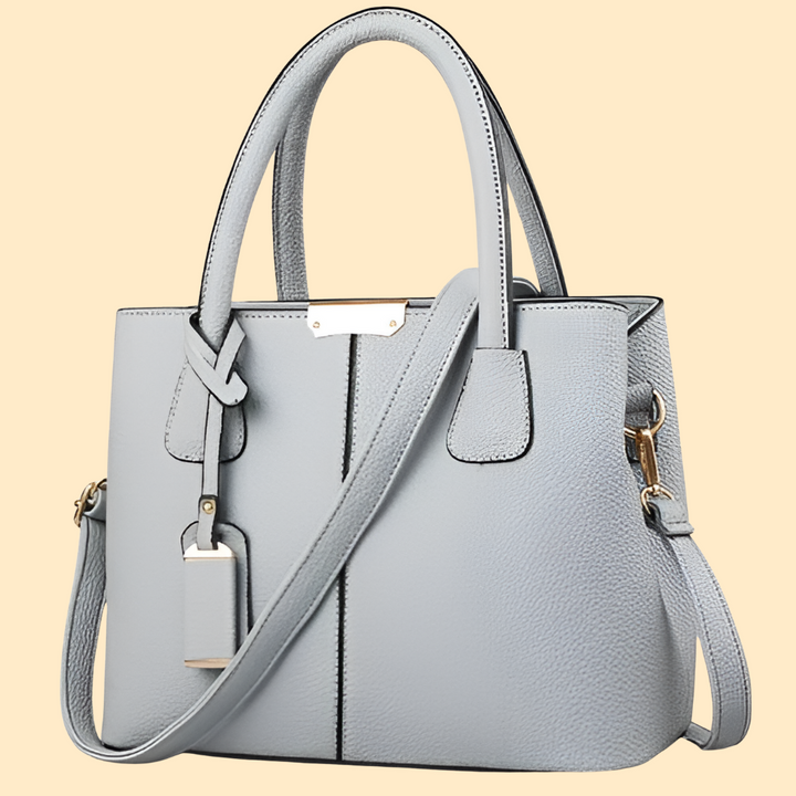Stylish women's structured satchel handbag. Rigid silhouette, elegant work & daily fashion accessory.