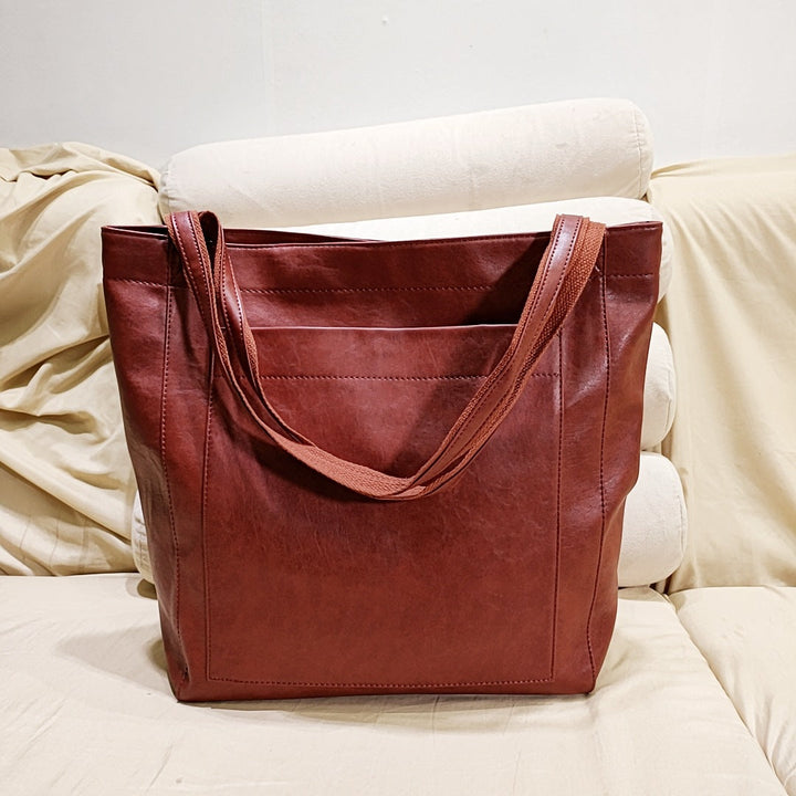 Stylish structured tote bag for women, an elegant handbag and fashion accessory. Versatile for shoulder & crossbody carry.