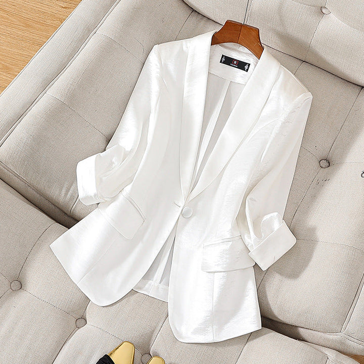 Chic pink tailored blazer for women, ideal for sophisticated office attire or versatile formal jacket.