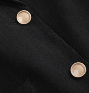 Sophisticated women's tailored blazer with notched lapels, a classic and elegant professional jacket.