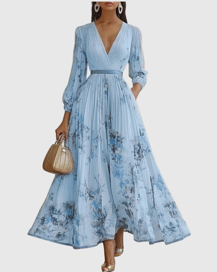 Woman modeling a flowing elegant V-neck A-line midi dress, showcasing versatile style.
