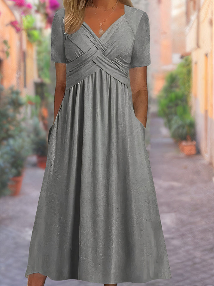 Versatile women's V-neck crisscross midi dress, an elegant sleeveless option for both casual & formal events.