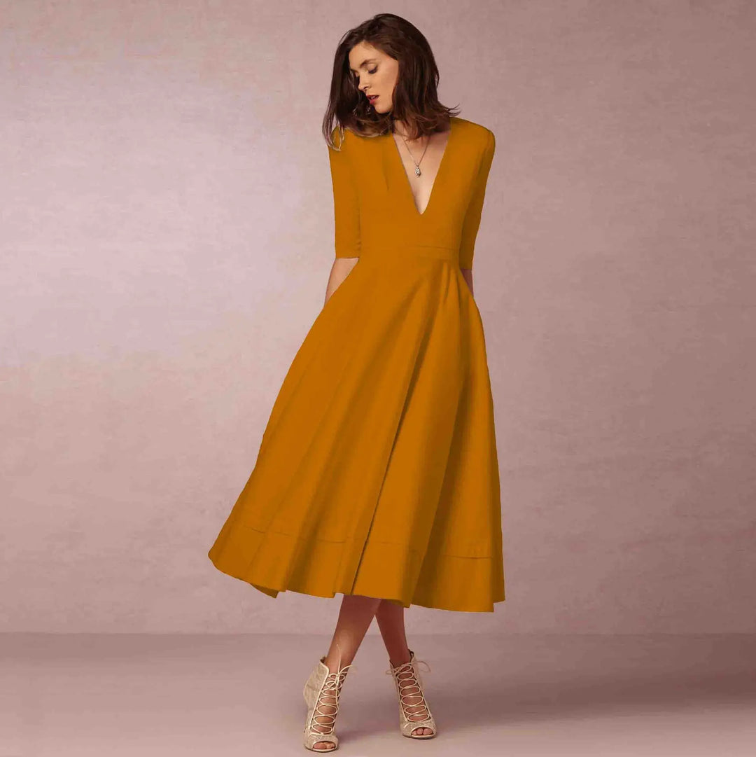 Black elegant V-neck midi dress with elbow sleeves, perfect for work, cocktails & events.