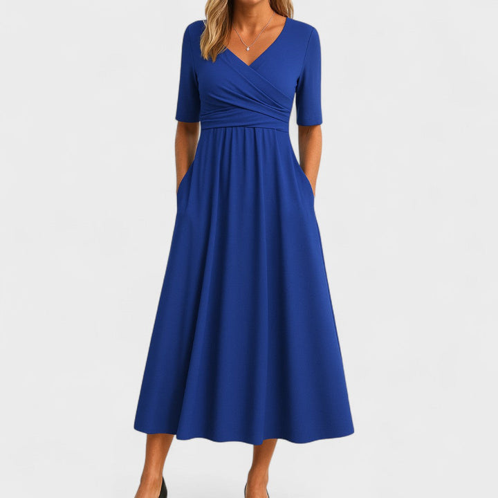 Versatile women's midi dress, V-neck, and crossover waist. An everyday elegant and flattering summer outfit.