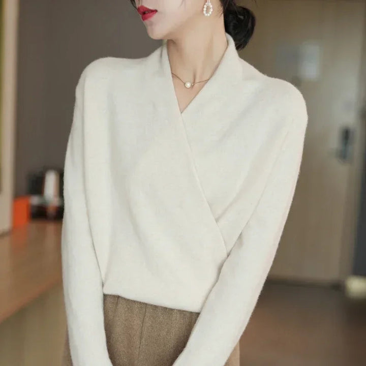 Classic women's V-neck pullover top, elegant apparel with a chic design, ideal for layering.