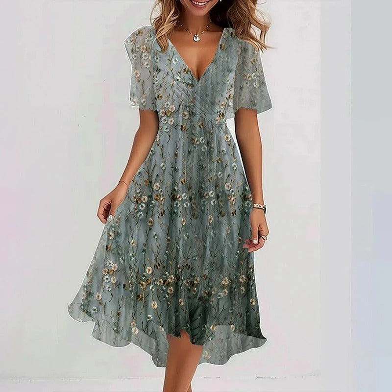 Women's elegant V-neck flutter sleeve wrap midi dress, a flowing and romantic design for summer parties.
