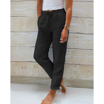 "Eleganti pantaloni uomo in lino blu morbido, design versatile, perfetti per look casual ed eleganti con vita regolabile."