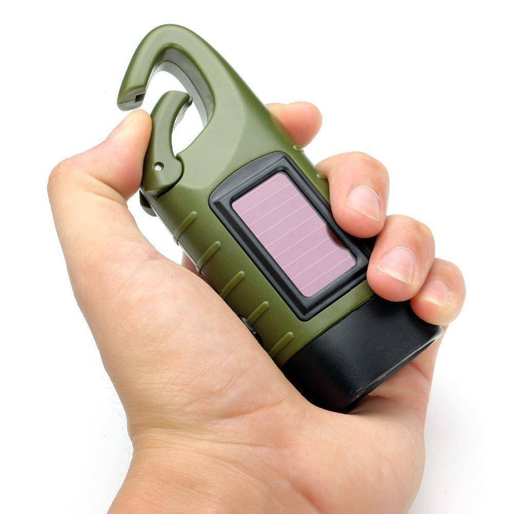 Compact hand crank solar flashlight, red, an essential for camping and outdoor