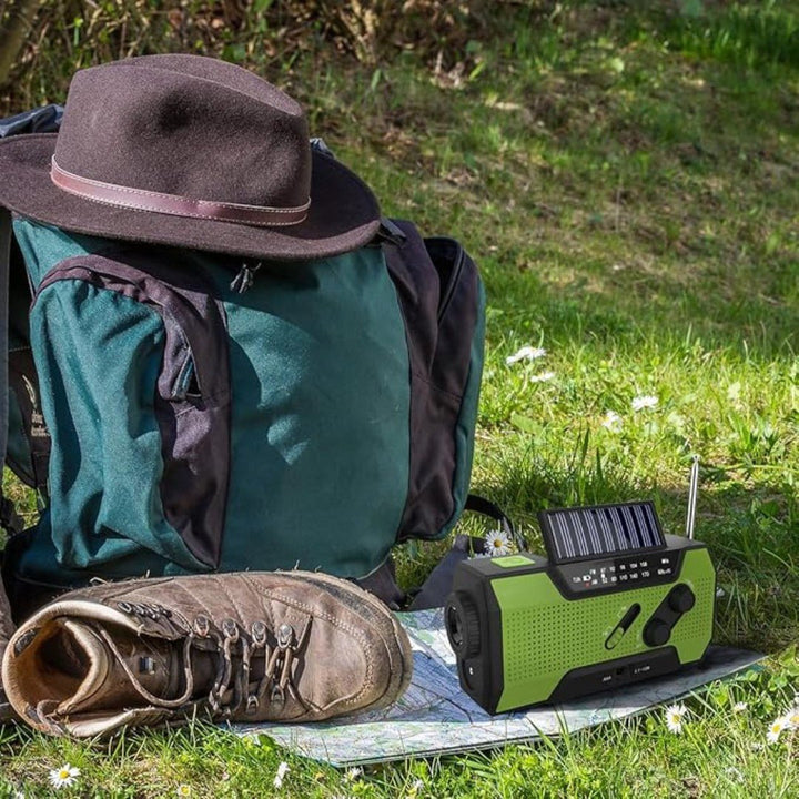 Weather alert radio powered by solar, hand crank, and USB, with a 4000mAh power bank