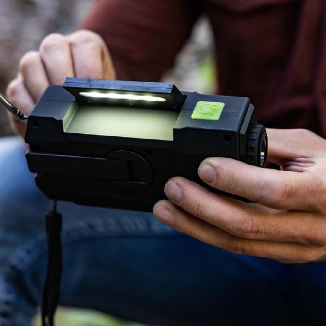 Versatile survival tool, a wind up radio with weather alert and integrated 4000mAh power bank
