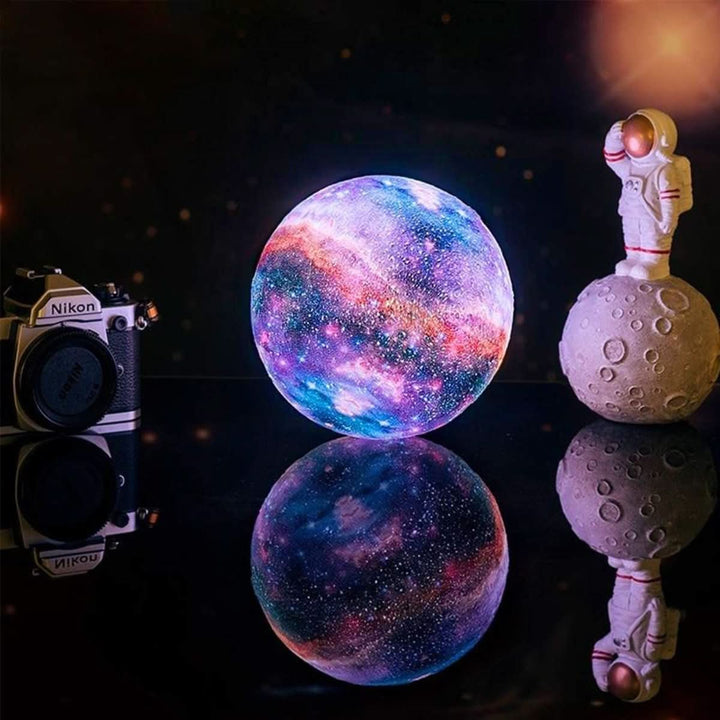 Detailed 3D Moon Lamp on a wooden stand, offering 16 soothing colors for a magical home decor piece.