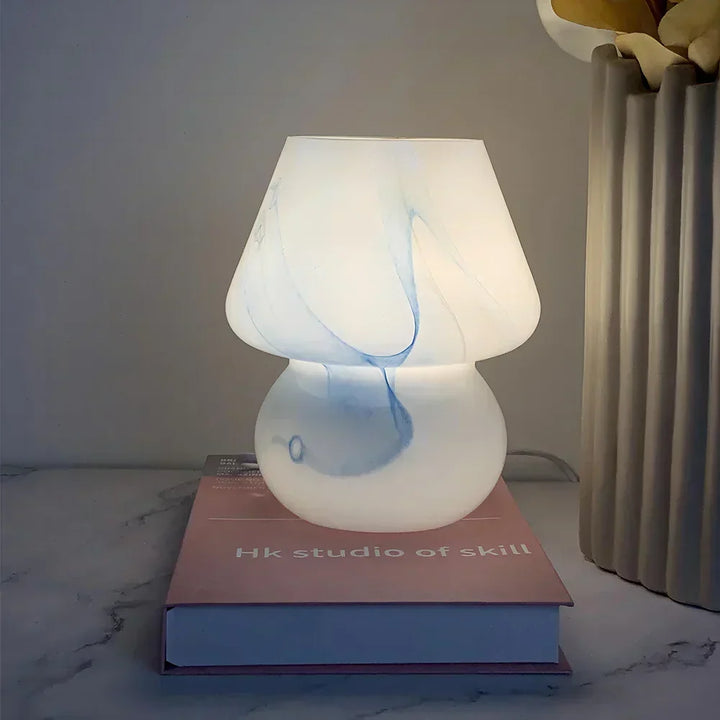 Elegant glass mushroom table lamp, ideal for accent lighting & creating a warm glow.