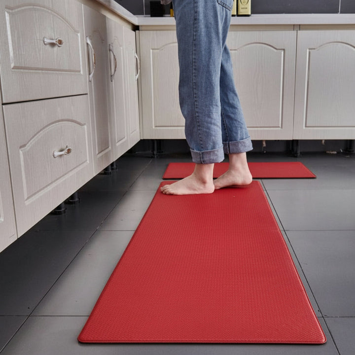 Ergonomic anti-fatigue kitchen mat for enhanced standing comfort. Non-slip & easy to clean home floor mat.