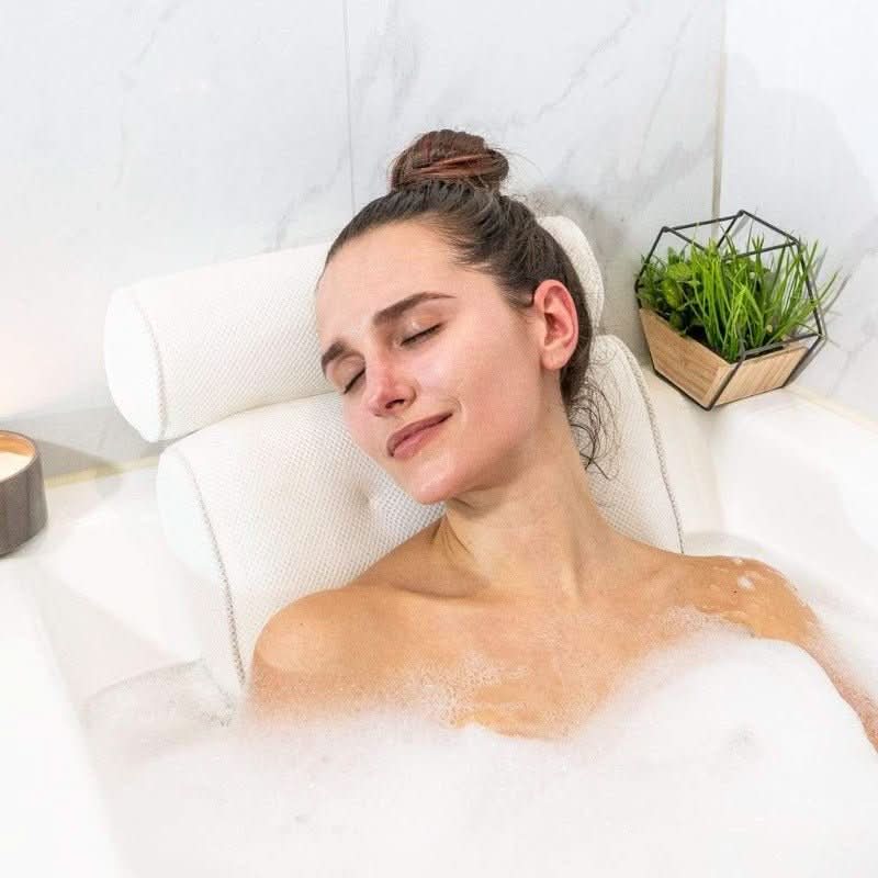 Comfortable bath cushion with strong suction cups for secure head and neck support. Enhances any relaxing bath experience.