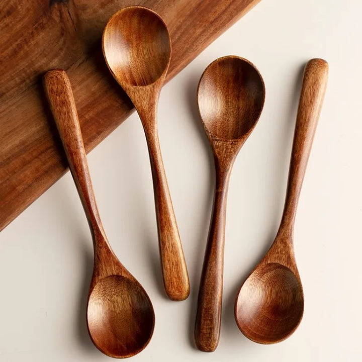 Farmhouse kitchen wood spoon set for cooking & serving. Natural, eco-friendly, & durable wooden utensils.