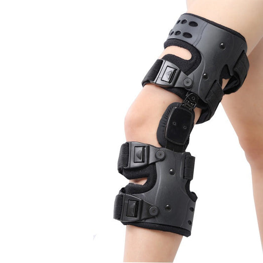 "Fascia ginocchio regolabile nera con chiusure veloci, design moderno per stabilità e sollievo dal dolore articolare."