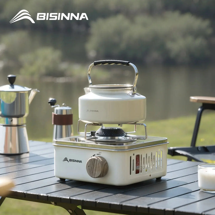 Foldable mini camping stove for backpacking, compact and lightweight portable gas stove design for outdoor cooking.
