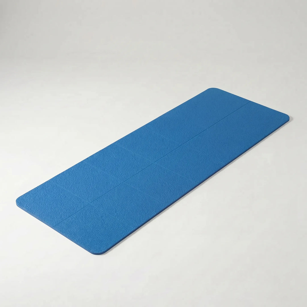 High-quality foldable TPE yoga mat for easy travel & storage. Portable exercise mat for fitness, yoga & pilates.