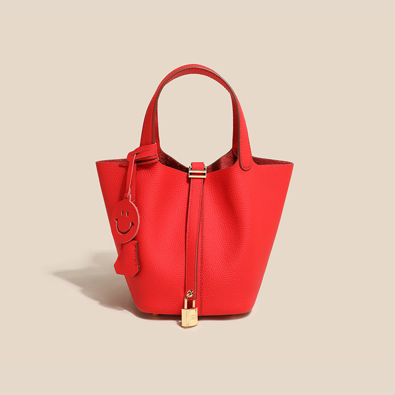 High-quality genuine leather bucket bag for women, chic and versatile accessory.