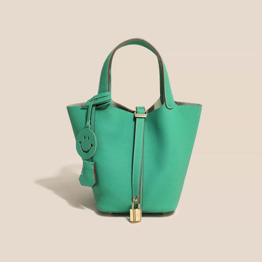 Designer quality genuine leather women's bucket bag, elegant everyday shoulder bag.