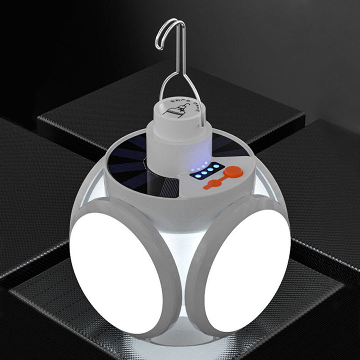 Unique geometric LED lamp, sculptural polygon design, emits warm accent light, elegant decor