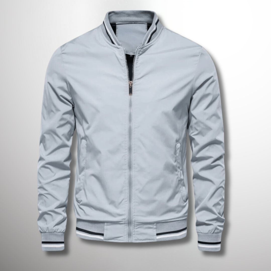 "Giacca leggera uomo idrorepellente blu con zip e tasche, ideale per stagioni di transizione, stile elegante e comfort"