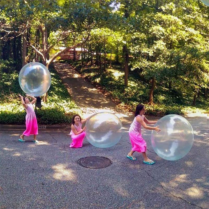 Inflatable giant bubble ball, ideal for kids' summer water and yard play.