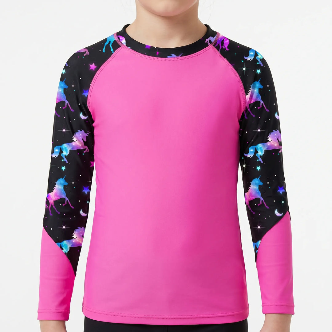 Stylish girls' long-sleeve rash guard, offering sun protection & comfort for summer water fun and beach days.